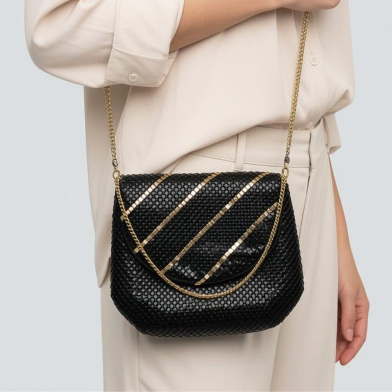 Black gold shining clutch bag